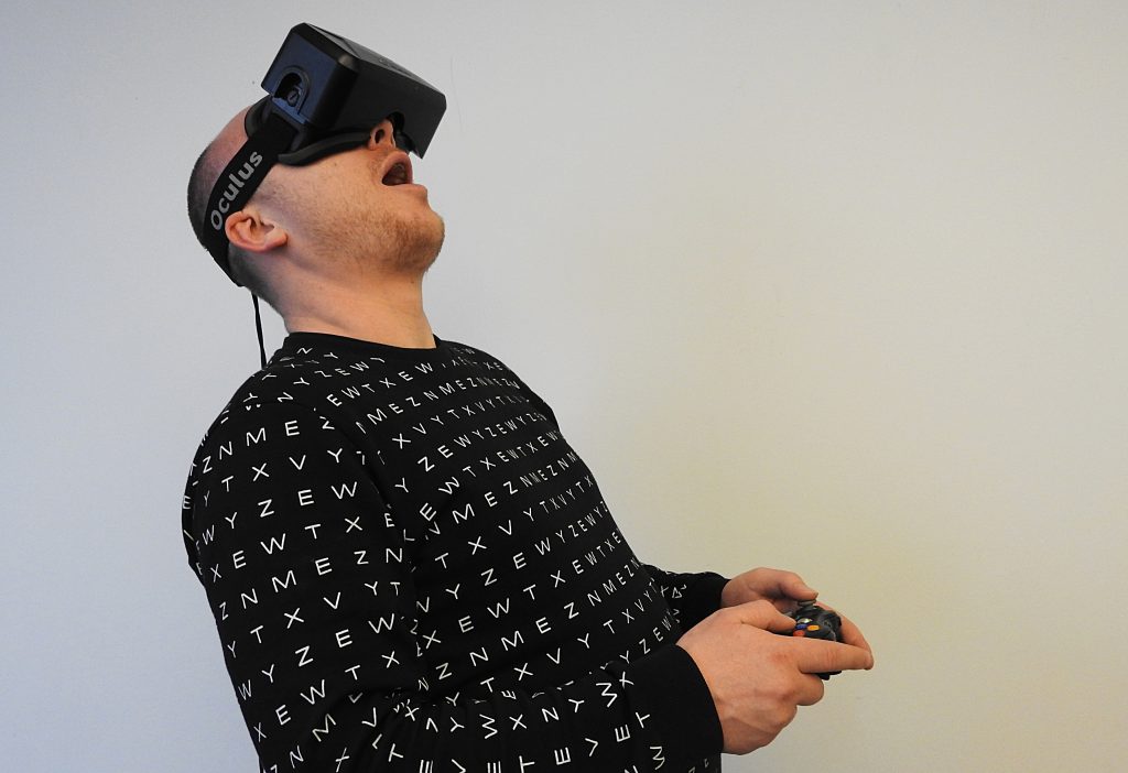 Man using Virtual Reality and gaming